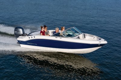 Chaparral 19 SSi OB cruising on a lake with four passengers front starboard view. 