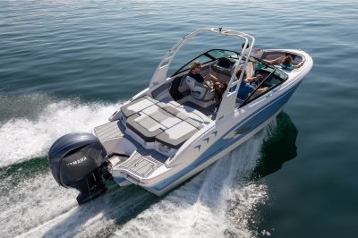 Chaparral 21 SSi OB four passenger running on a lake rear starboard view. 