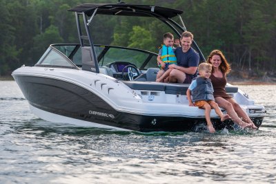 Chaparral 21 SSi family of 4 enjoying the sun pad and swim platform 
