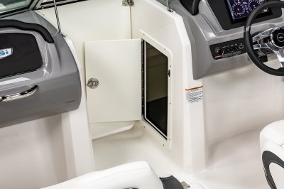 Chaparral 21 SSi Ski & Fish latching storage compartment built into the starboard console 