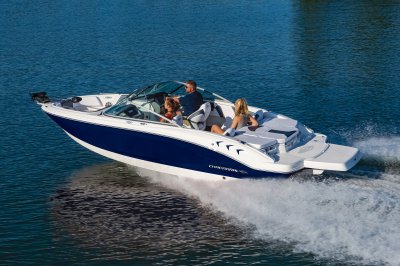 Chaparral 21 SSi Ski & Fish cruising on lake with 3 passengers rear port view 