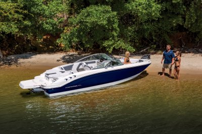 Chaparral 21 SSi Ski & Fish on lake shore with passengers walking and relaxing in the bow 
