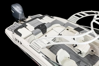 Chaparral 23 SSi OB u-shaped seating with cushioned bolsters and storage built in underneath. 