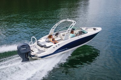 Chaparral 23 SSi OB cruising on lake with 4 passengers rear starboard view. 