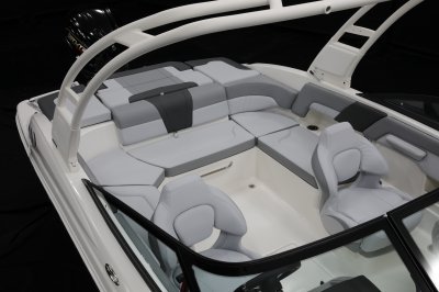 Chaparral 23 SSi OB u-shaped seating with cushioned bolsters and storage built in underneath 