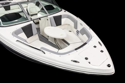 Chaparral 23 SSi bow seating area with optional table installed with two cupholders. 