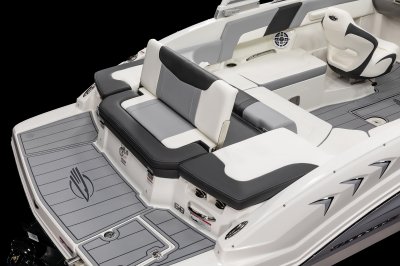 Chaparral 23 SSi sunpad can change into a rear facing bench that gives easy access to the water. 