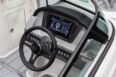Chaparral GTS 1 helm station with tilting steering wheel and Simrad display. 