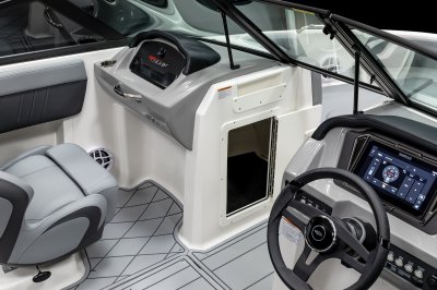 Chaparral GTS 1 port console has a storage compartment built in the bow walkway. 