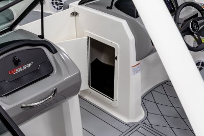 Chaparral GTS 1 helm console has a storage compartment built in the bow walkway. 