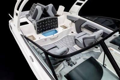 Chaparral GTS 1 has storage built underneath cockpit seating, with insulated cooler under center seat. 