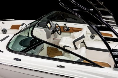 Chaparral GTS 3 has matched consoles with bucket seats mounted at each. 