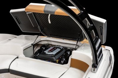 Chaparral GTS 3 sunpad lifts up with shocks for wide engine access bay. 