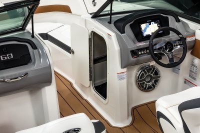 Chaparral GTS 3 helm console has a storage compartment built in the bow walkway. 
