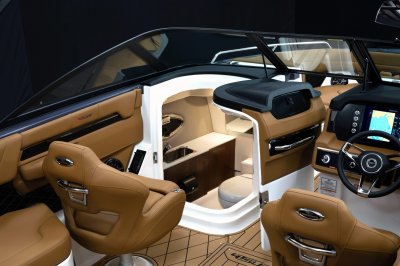 Chaparral GTS 6 head compartment with a sink, toilet, and a portlight. 