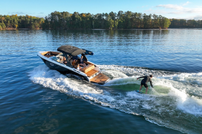 Chaparral GTS 6 surfing on a lake with four passengers. 