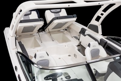 Chaparral 250 OSX cockpit storage built under twin lounges and benches. 