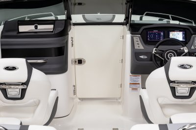 Chaparral 250 OSX one-piece weather door separates the bow from cockpit. 