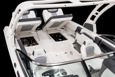 Chaparral 250 OSX plastic tubs lift from under lounge seats for utility access. 