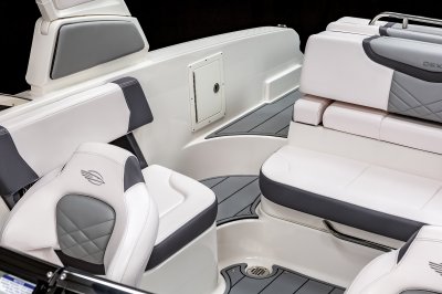 Chaparral 270 OSX wide walkway with two steps and battery switch door. 