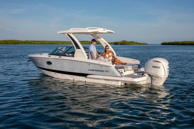 Chaparral 270 OSX lounging in ocean rear port view 