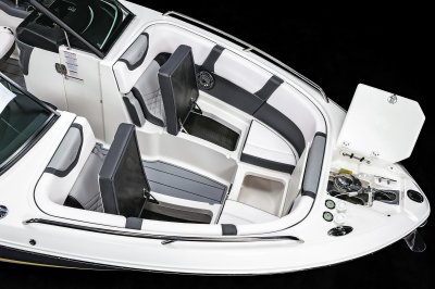 Chaparral 270 OSX bow storage compartments built under seating with insulated cooler. 