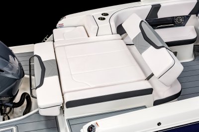 Chaparral 270 OSX wide walkway with two steps and battery switch door. 