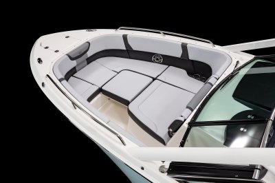 Chaparral 280 OSX bow filler cushion creates large sunpad out of bow seating. 
