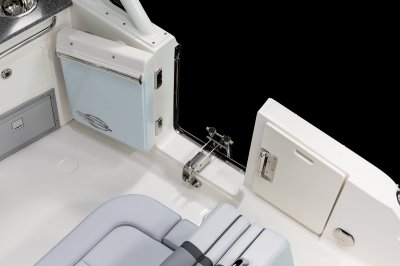 Chaparral 280 OSX side-entry door with polished metal hardware and magnetic latch. 