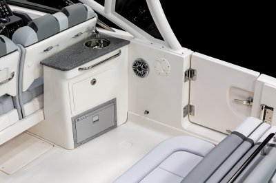Chaparral 280 OSX cockpit wetbar with sink, counter, refrigerator and storage drawer. 