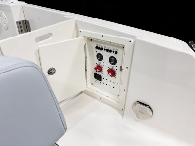 Chaparral 280 OSX battery switches behind door found in the transom walkway. 