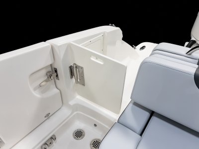 Chaparral 280 OSX walkway has a latching door separating swim platform from cockpit. 