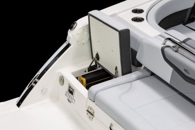 Chaparral 280 OSX transom port seat cushion lifts on hinges for utility access. 
