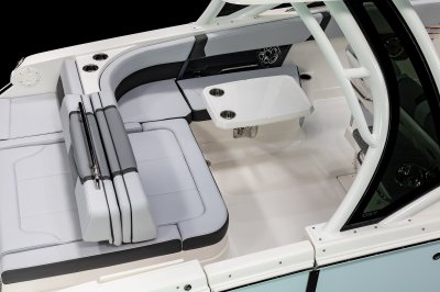 Chaparral 280 OSX table mounted on the port wall with metal hardware 