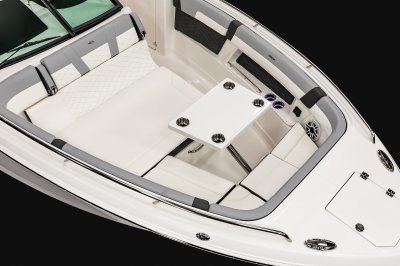 Chaparral 310 OSX bow with table with 4 cupholders installed on metal hardware. 