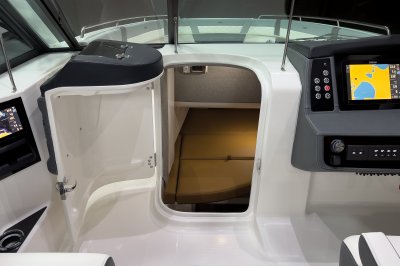 Chaparral 310 OSX cabin houses a wide mattress and head. 