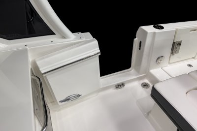 Chaparral 310 OSX side-entry door with polished metal hardware and magnetic latch. 