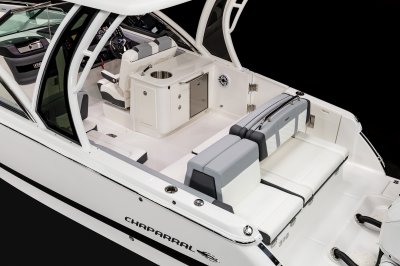 Chaparral 310 OSX back-to-back aft bench seat with thick cushioning. 