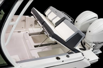 Chaparral 310 OSX lid under rear bench lifts for bilge access. 