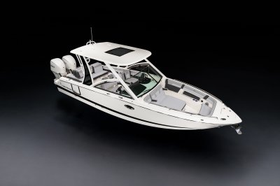 Chaparral 310 OSX front starboard view on a black background 