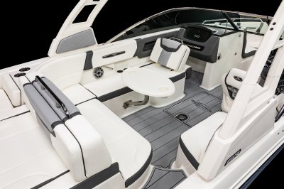 Chaparral 247 SSX table mounted on port bench with two cupholders and stainless steel hardware. 