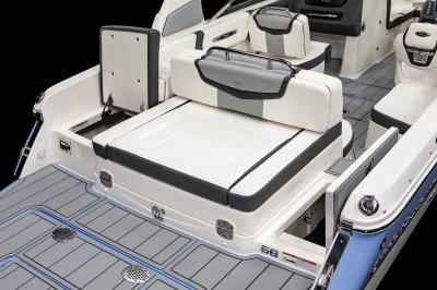Chaparral 247 SSX storage compartment and bilge access under port jump seat. 