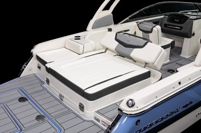Chaparral 247 SSX aft bench seat converts to aft facing sunpad. 