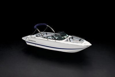 Chaparral SSX 4 front starboard view with bimini top closed on a black background 