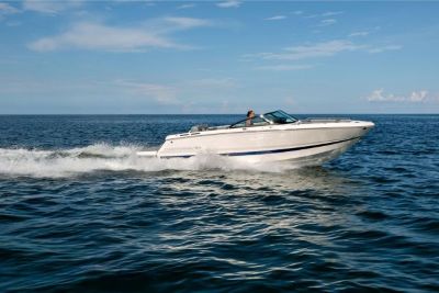 Chaparral SSX 4 cruising on a lake starboard view 