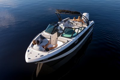 Chaparral SSX 4 OB two people in bow of boat with two people on lounge 