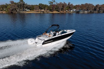Chaparral SSX 4 OB with trees in the background on a lake 