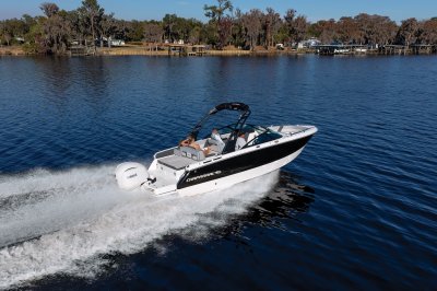 Chaparral SSX 4 OB with trees in the background on a lake 