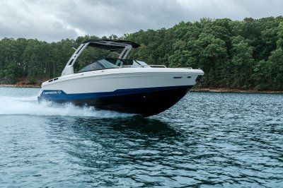 Chaparral SSX 6 running on a lake near the tree cover shoreline 
