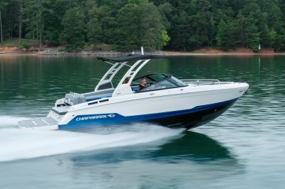 Chaparral SSX 6 running on a lake with trees on the shoreline 